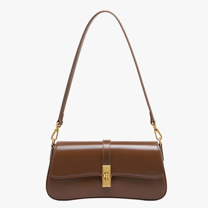 Accessorio moda donna: borsa baguette rosso vino, chic e compatta per ogni occasione.