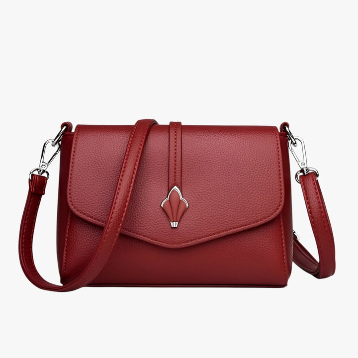 Borsa a tracolla donna elegante con patta, perfetta per look quotidiani e serali e viaggi.