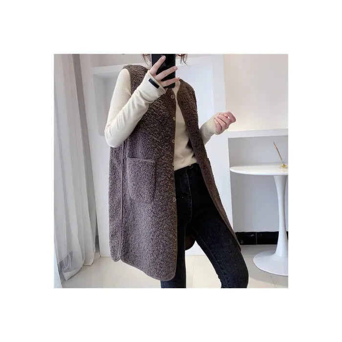 Gilet da donna in misto lana, lungo e senza maniche, con design elegante e minimalista per un look raffinato.