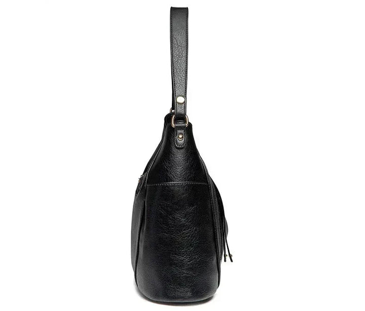 Borsa donna grigia effetto pelle, versatile e pratica. Perfetta per il giorno, dal lavoro allo shopping.