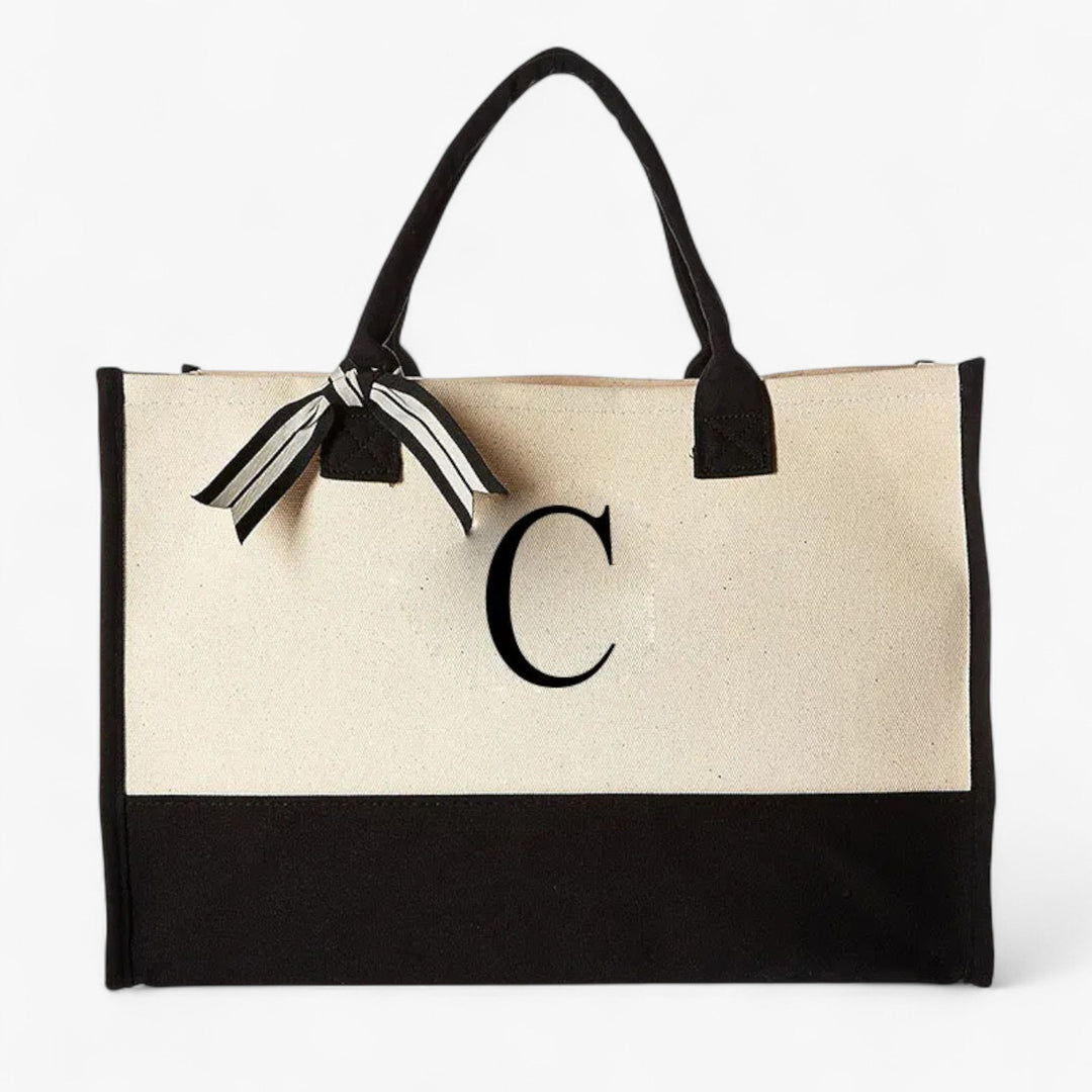 Stile unico con la borsa tote da donna beige e nera. Personalizza con iniziale, accessorio quotidiano.