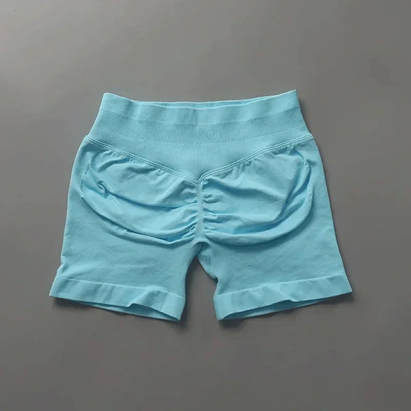 Short sportivi seamless donna, vita alta, tessuto traspirante per un fresco allenamento.