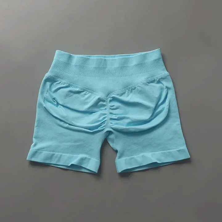 Short sportivi seamless donna, vita alta, tessuto traspirante per un fresco allenamento.
