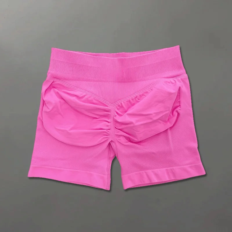 Short sportivi donna seamless vita alta, ideali per pilates e ginnastica.