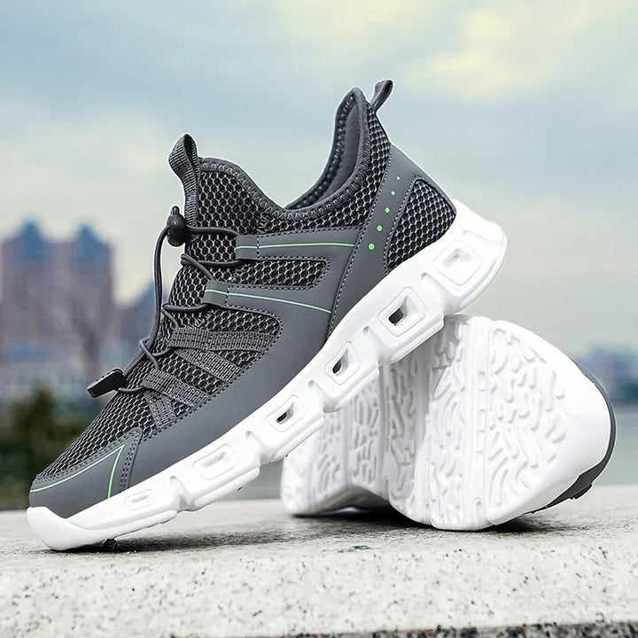 Calzature sportive da uomo leggere, ammortizzate, con chiusura rapida, ideali per il running.