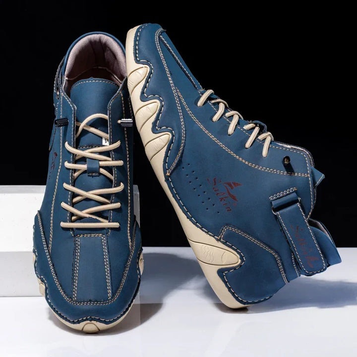 Sneakers High Top uomo invernali con suola ammortizzata. Design moderno e comfort versatile per ogni occasione.
