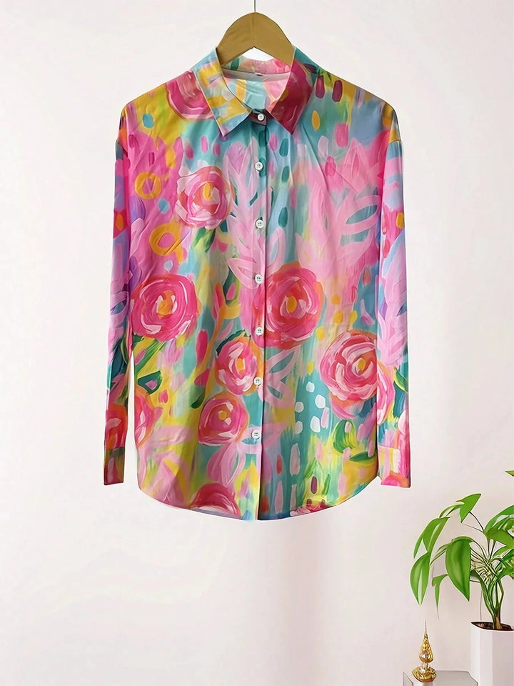 Design ampio e floreale per questa blusa donna a maniche lunghe, un capo versatile e alla moda per ogni occasione.