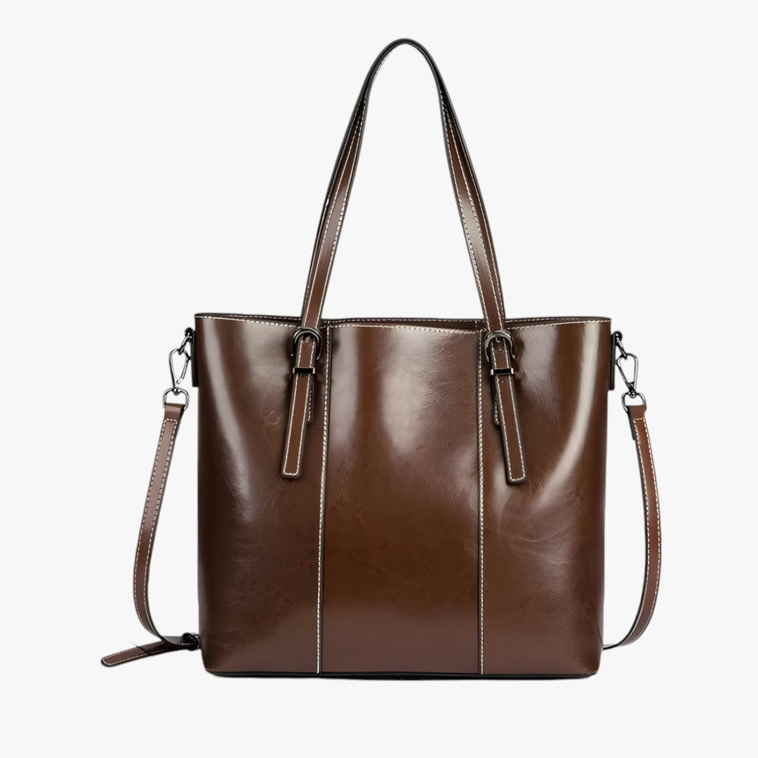 Borsa tote donna marrone scuro, texture raffinata. Eleganza quotidiana e accessorio viaggio versatile.