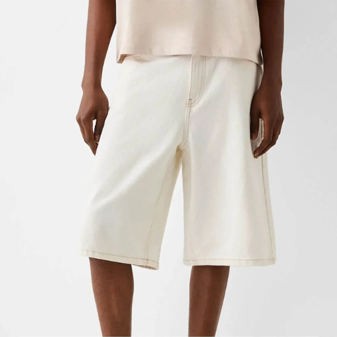 Bermuda uomo baggy fit sotto ginocchio, stile vintage. Shorts casual perfetti per l'estate e il relax.