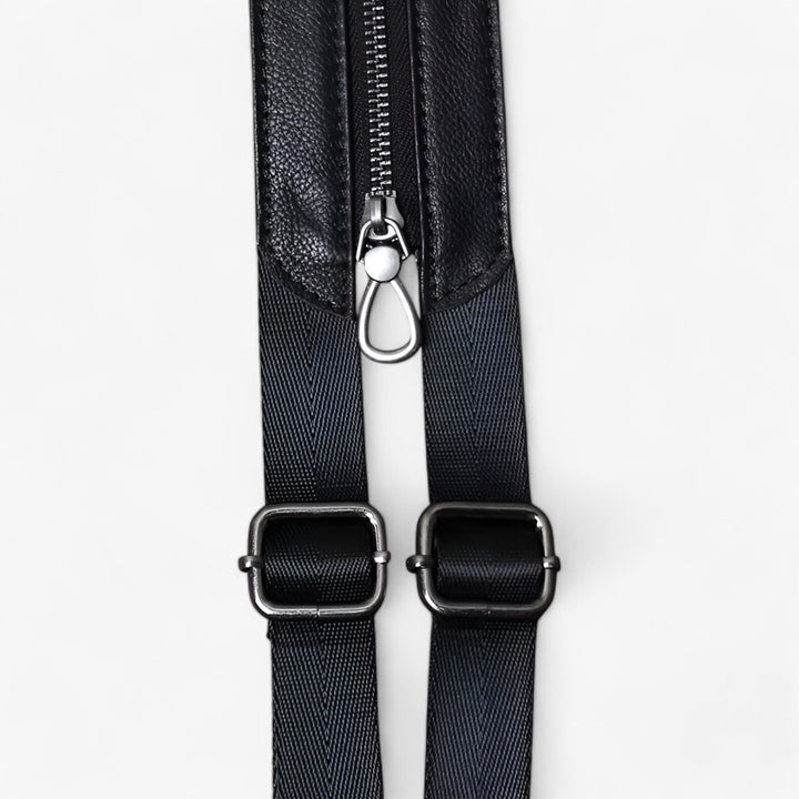 Borsa donna nera versatile, trasformabile in zaino. Accessorio multitasche elegante per la vita di tutti i giorni.