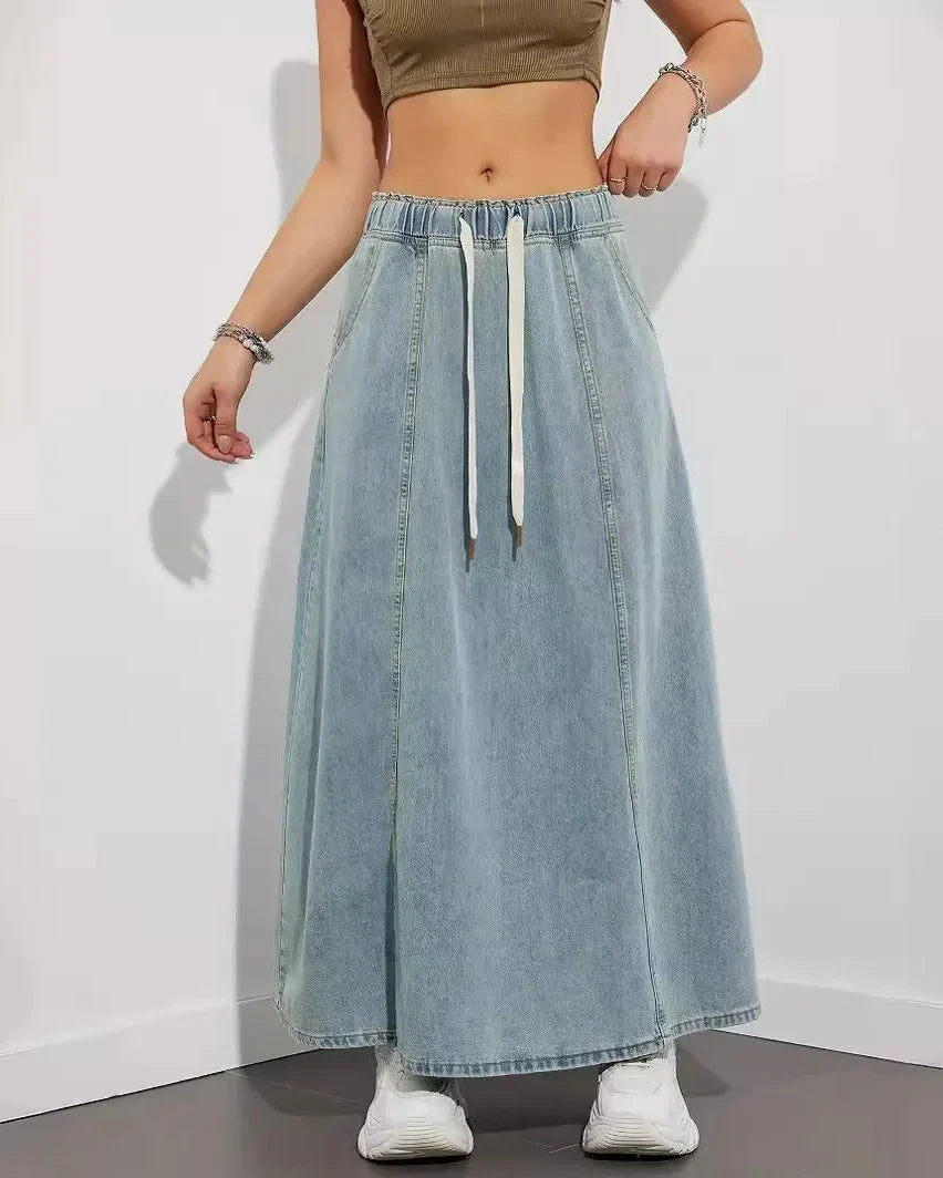 Gonna maxi donna nera con vita elasticizzata e tasche, ideale per un look casual confortevole primavera/estate.