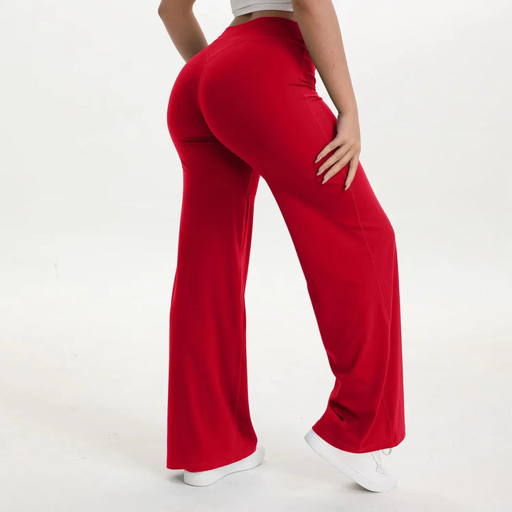 Pantaloni sportivi donna con vita alta e gamba ampia, design per yoga, pilates e benessere generale.