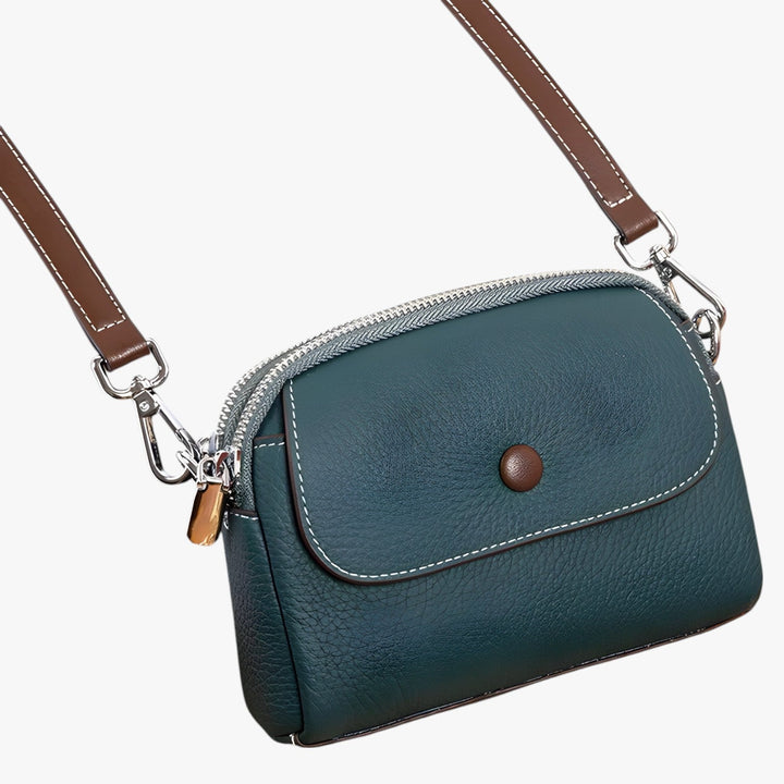 Borsa a tracolla femminile, design sofisticato, ideale per completare un outfit elegante o casual.