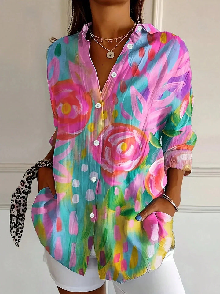 Blusa floreale da donna a maniche lunghe con vestibilità ampia, perfetta per un look casual-chic primaverile.