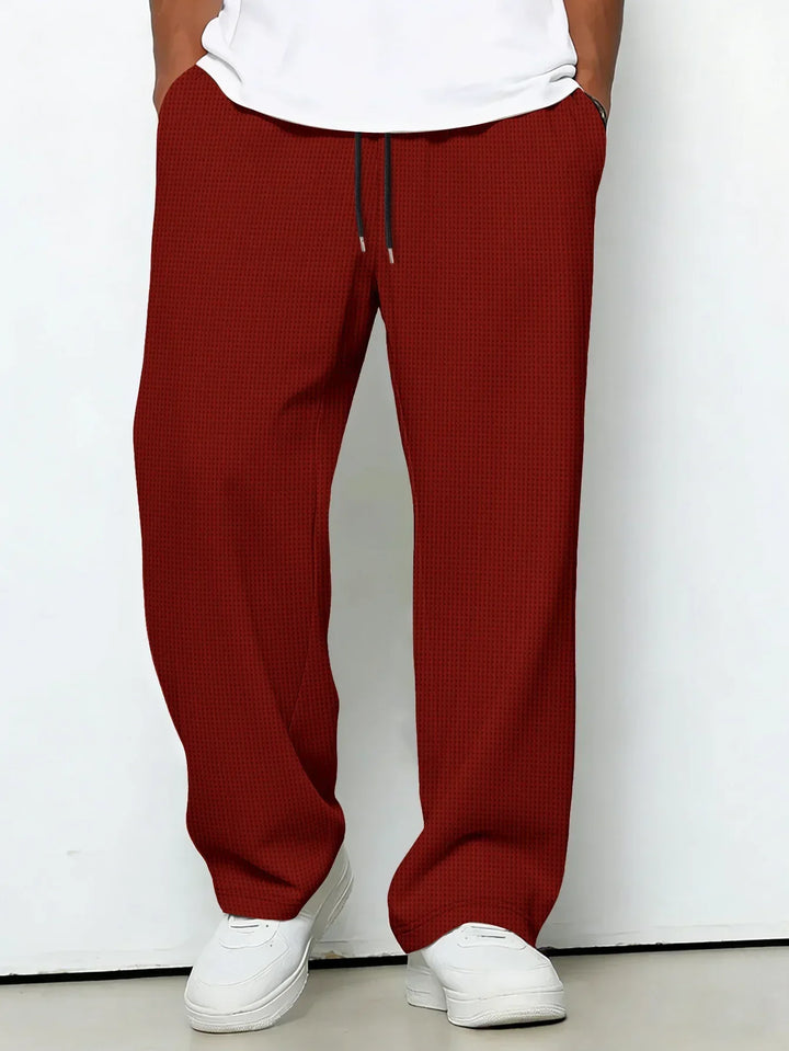 Pantaloni casual uomo dal taglio rilassato. Eleganza discreta per un look versatile ogni giorno.