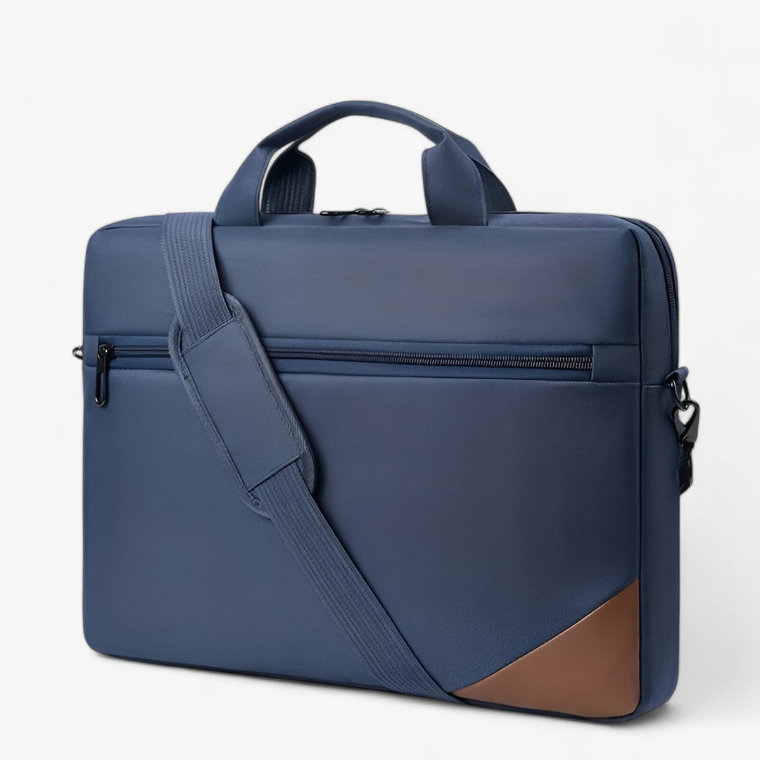 Borsa porta laptop rossa dal design moderno, con tracolla removibile, offre praticità per lavoro e viaggio.