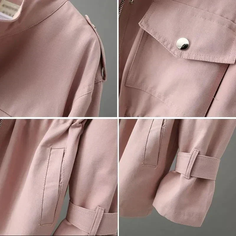 Dettaglio dei bottoni su trench impermeabile da donna, tessuto resistente. Stile classico per protezione dalla pioggia.