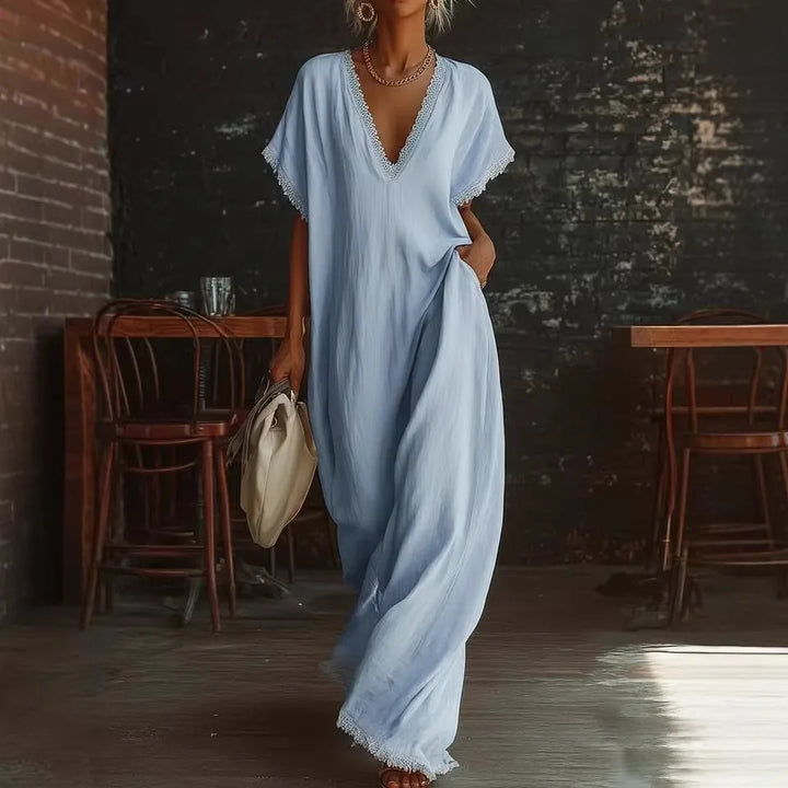 Vestito fluido donna estivo, con scollo V e pizzo, per un look casual chic e confortevole.