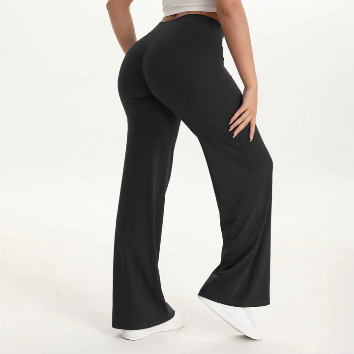 Pantaloni elasticizzati donna per yoga e pilates, vita alta con gamba ampia per stile e comfort.