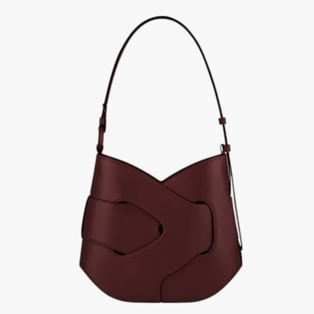 Vista laterale borsa a spalla donna elegante bordeaux scuro in sintetico intrecciato, versatile e chic.