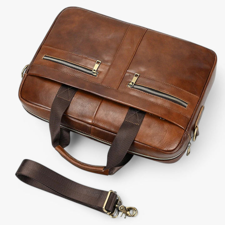 Borsa portadocumenti sintetica nera da uomo con tracolla, ideale per il lavoro e i viaggi.