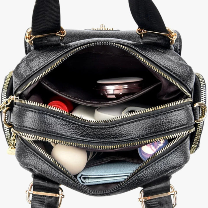Borsa a mano donna nera, multitasche, con tracolla regolabile. Elegante accessorio moda donna, perfetta per il quotidiano.