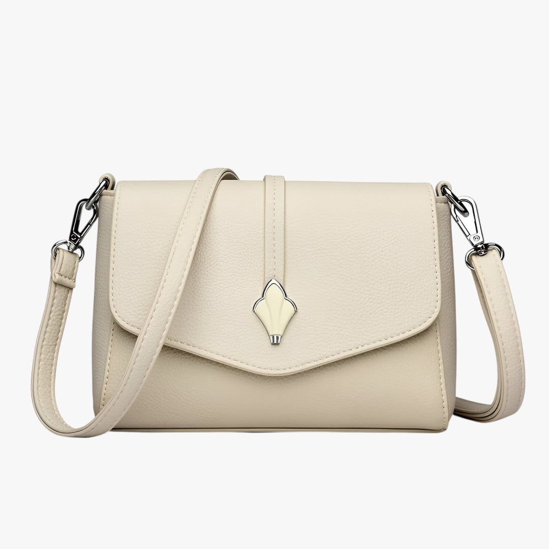 Borsa a tracolla donna, elegante e quotidiana, con patta. Ideale per moda e accessori femminili.