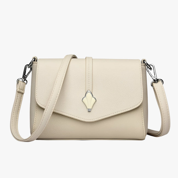 Borsa a tracolla donna, elegante e quotidiana, con patta. Ideale per moda e accessori femminili.