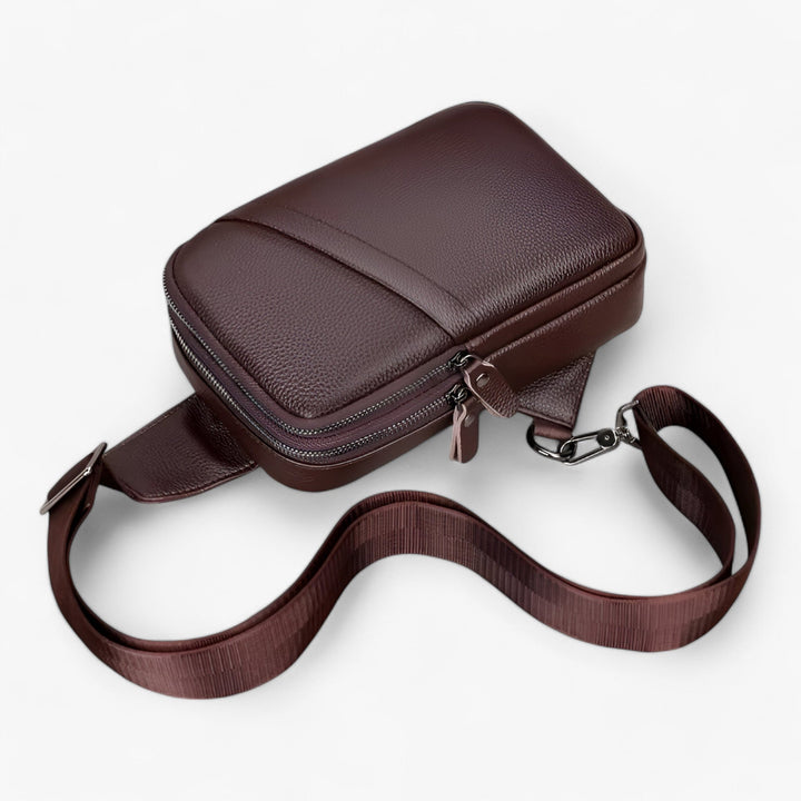 Elegante borsa monospalla nera unisex, compatta e funzionale per organizzazione quotidiana. Perfetta per ogni avventura.