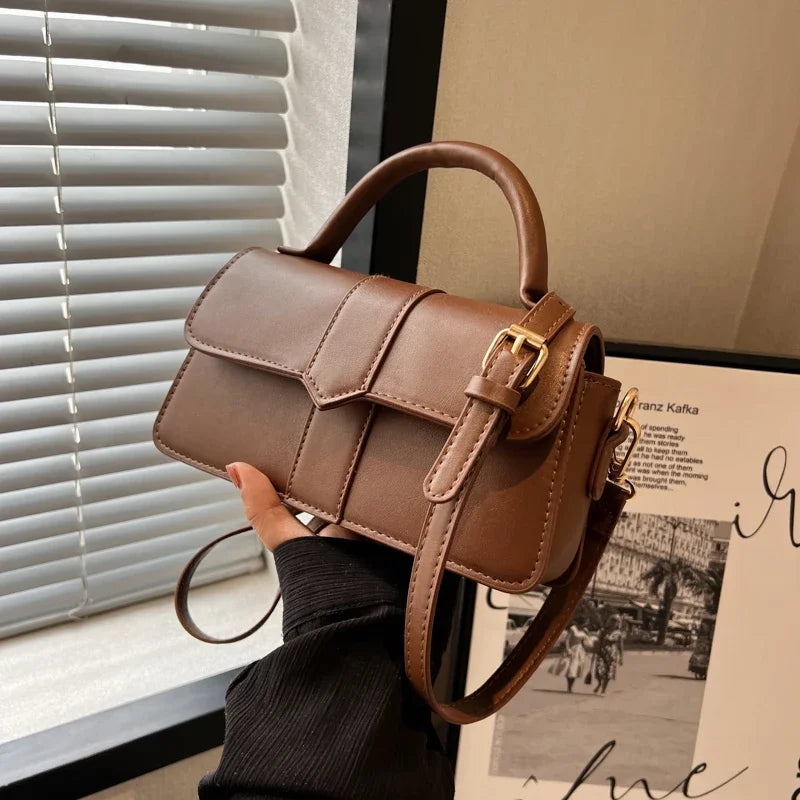 Borsa a tracolla donna in pelle vintage, elegante e alla moda, perfetta per ogni occasione.