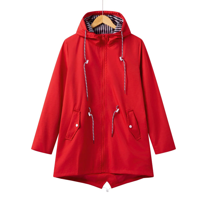 Giacca antipioggia trench donna, impermeabile e con cappuccio, capo essenziale per protezione e look elegante.