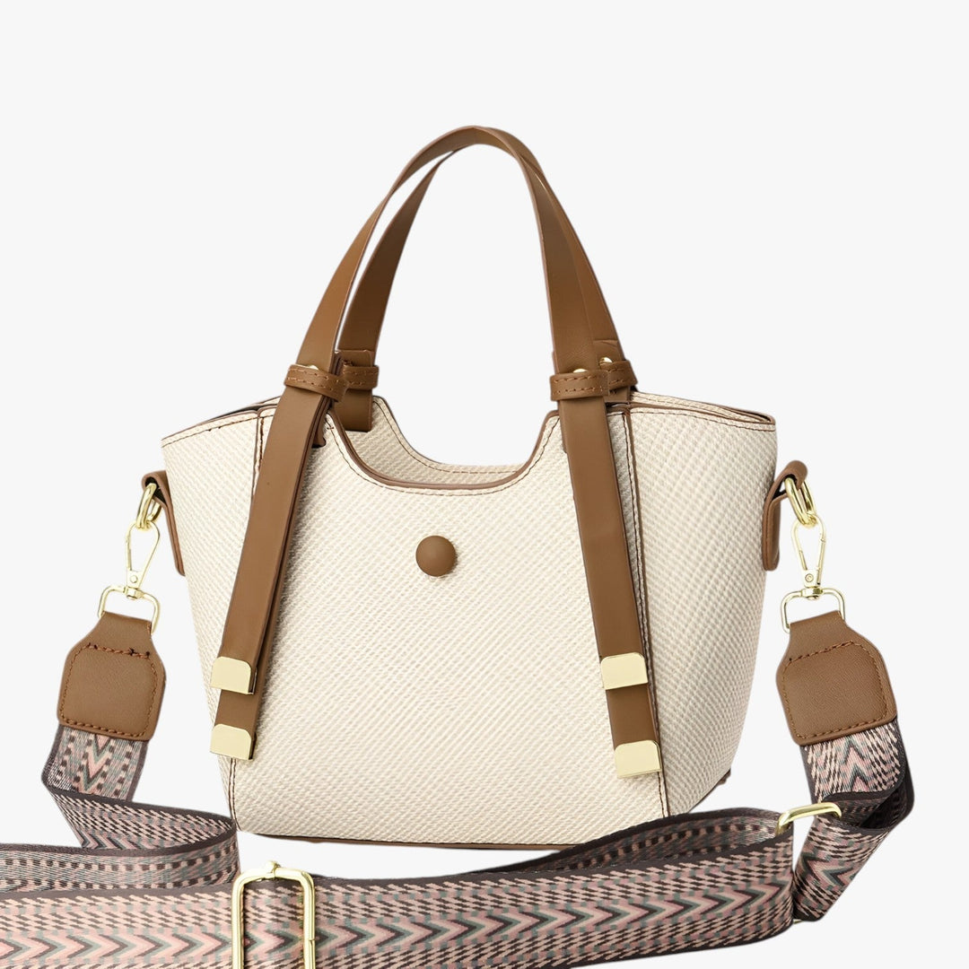 Elegante borsa tote donna compatta, versatile accessorio moda a mano o tracolla per ogni giorno.