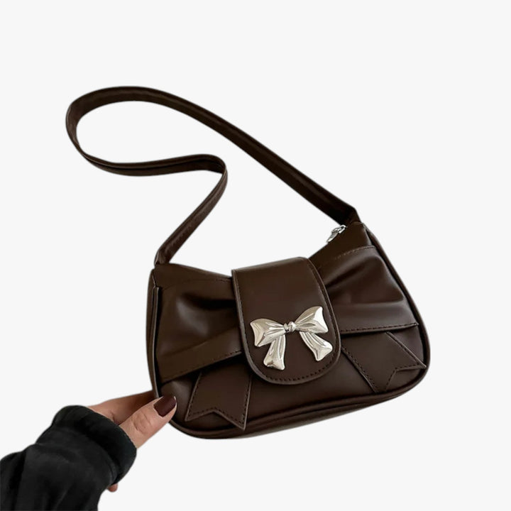 Pochette rosa da donna, borsetta compatta ed elegante per un tocco di colore vivace e chic.