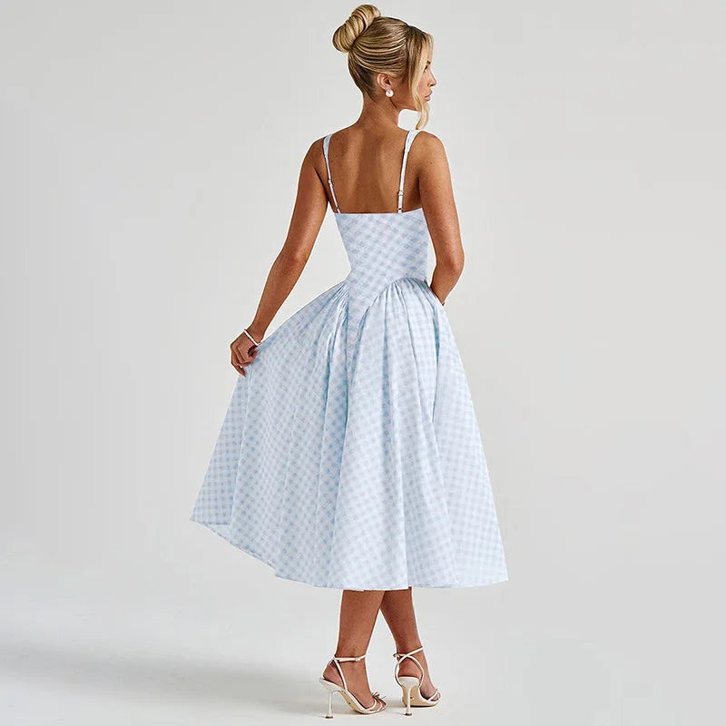 Abito lungo donna casual estivo a trapezio con spalline regolabili. Must-have per vacanze e moda mare.
