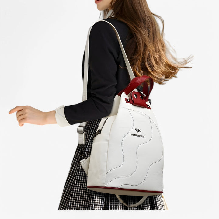 Zaino donna versatile blu per ufficio e tempo libero, ideale per un look chic e pratico. Borsa compatta.