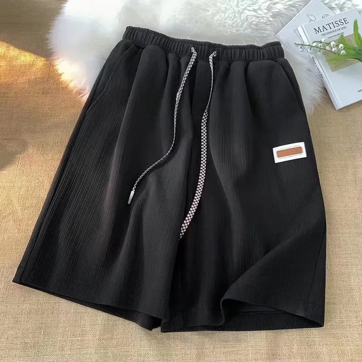Pantaloncini sportivi unisex leggeri e traspiranti per uomo e donna. Quick dry, ideali per ogni attività.