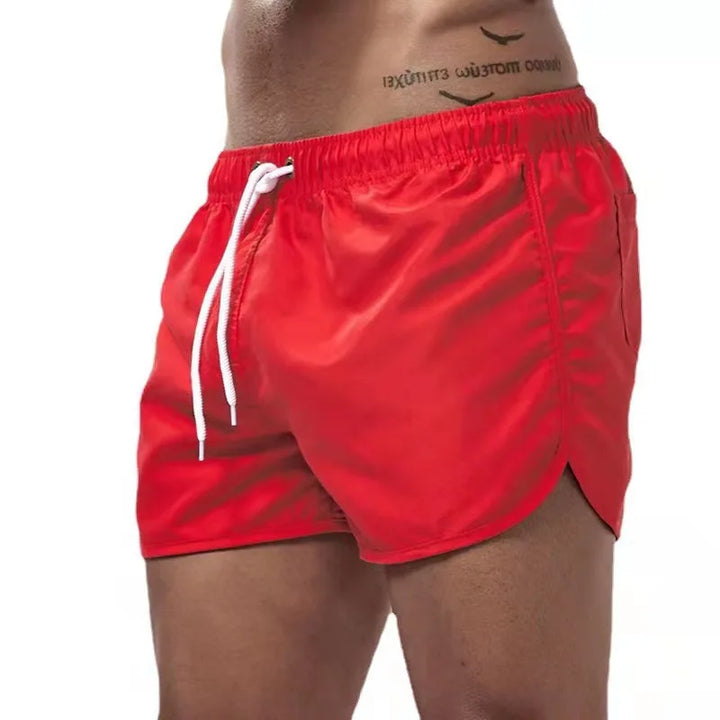 Pantaloncini sportivi uomo per nuoto, surf e sport acquatici. Tessuto ad asciugatura rapida, perfetti.