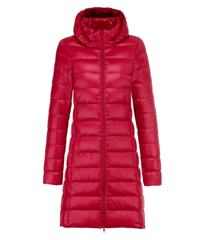 Giacca piumino lunga da donna, elegante e pratica. Ultraleggera, calda e con colletto staccabile.