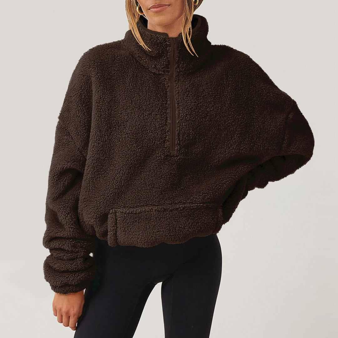 Maglione donna in maglieria, vestibilità comoda, con mezza zip e colletto. Perfetto per il casual.