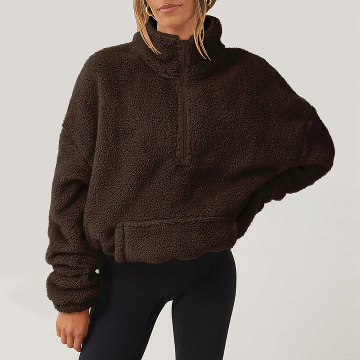 Maglione donna in maglieria, vestibilità comoda, con mezza zip e colletto. Perfetto per il casual.