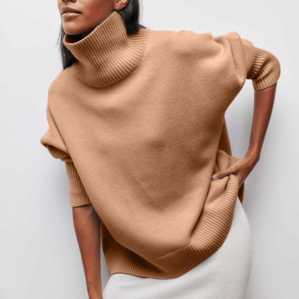 Maglia donna collo alto e maniche lunghe, stile aderente. Perfetta per look autunnali e invernali, un classico chic.