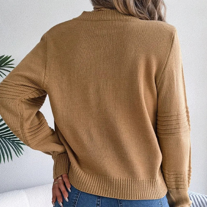 Maglione donna girocollo elegante, essenziale per stile e comfort quotidiano. Moda femminile versatile.