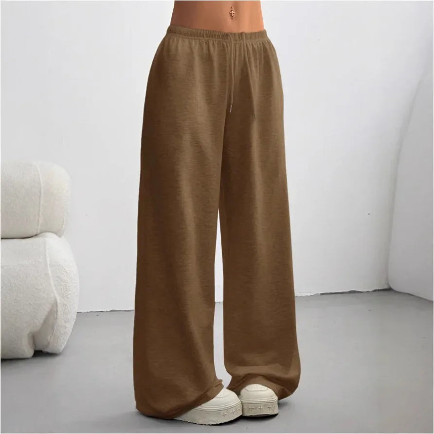 Pantaloni jogger donna a gamba larga, casual ed eleganti per un look moderno e comodo.