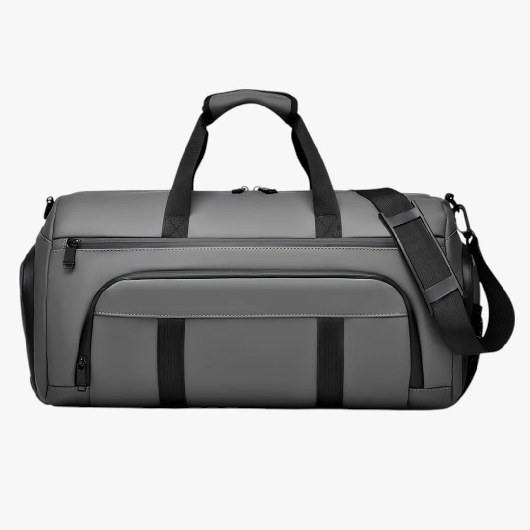 Ampio borsone sportivo unisex con tracolla regolabile e scomparti, ottimo per palestra e viaggi.