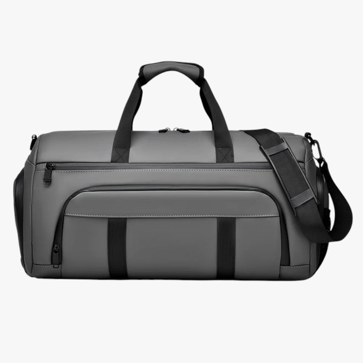 Ampio borsone sportivo unisex con tracolla regolabile e scomparti, ottimo per palestra e viaggi.