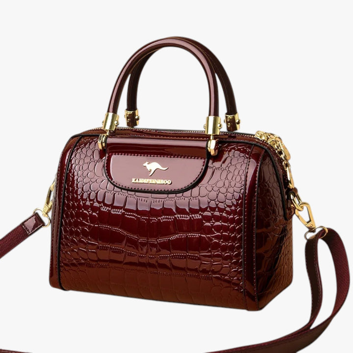 Borsa donna a mano unica, multicolore con stampa effetto coccodrillo, per stile e praticità.