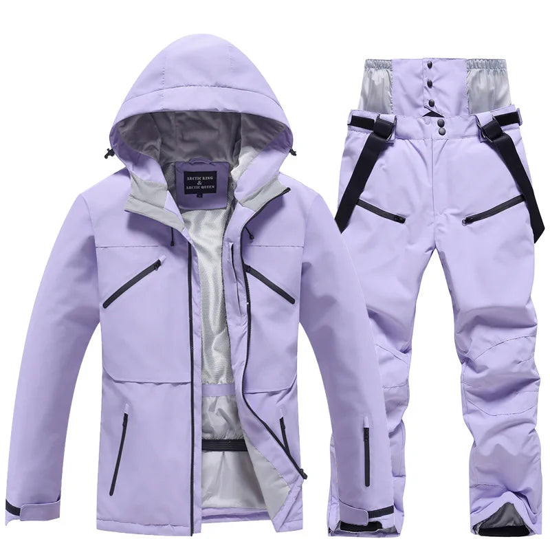 Giacca e pantaloni sci unisex, caldi e isolati, per affrontare l'inverno in montagna.