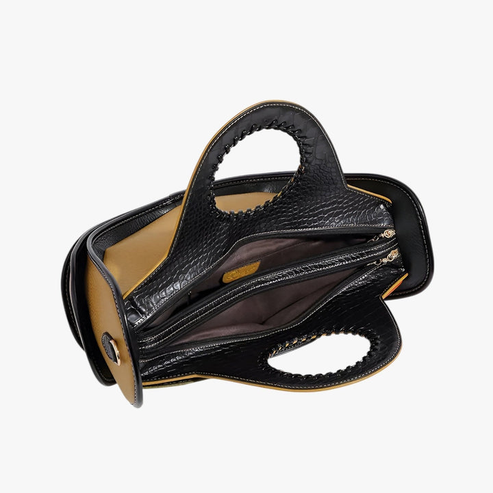 Dettaglio borsa a mano donna Mosaico multicolore, motivo geometrico moderno e manici eleganti.