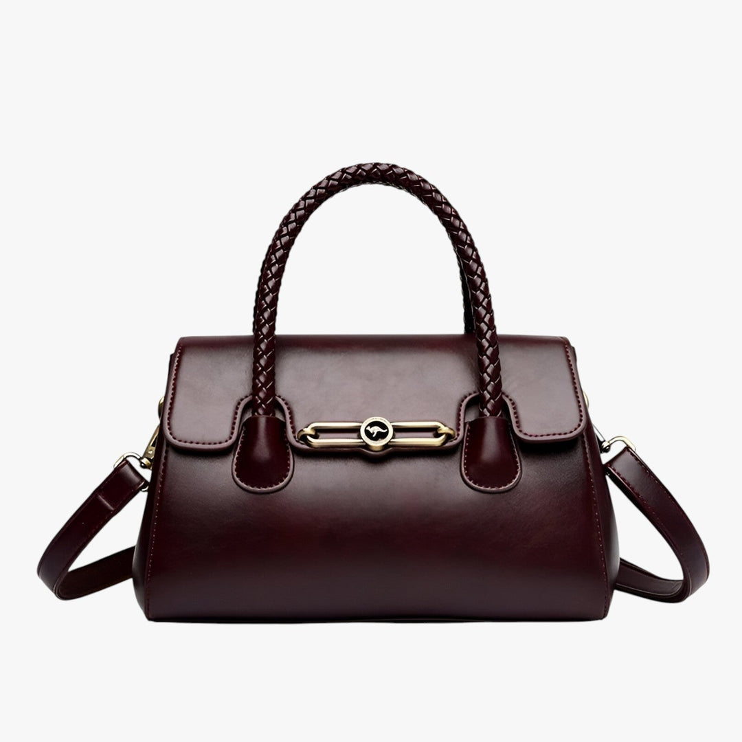 Borsa a mano marrone per donna, stile elegante e versatile, accessorio irrinunciabile per ogni occasione.