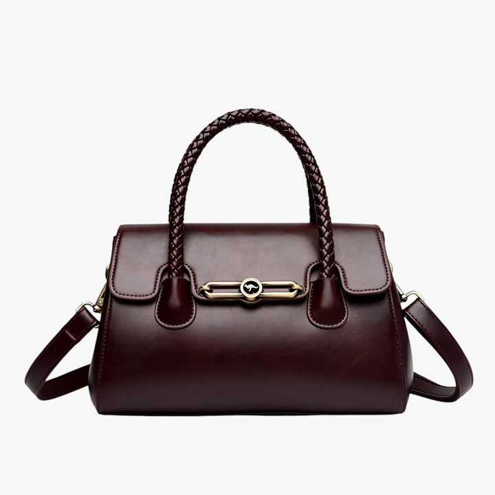 Borsa a mano marrone per donna, stile elegante e versatile, accessorio irrinunciabile per ogni occasione.